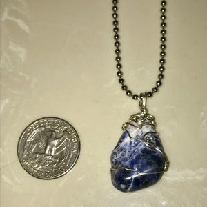 Sodalite hand wrapped pendant.
